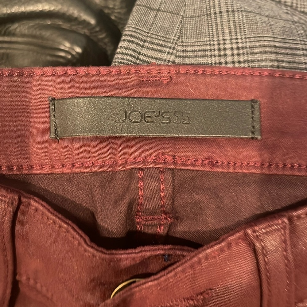 Shiny burgundy skinny jeans